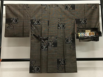 平和屋着物＃道中着　本場大島紬　9マルキ　古代染色　純泥染め　舞花文　ロング丈　証紙付き　正絹　逸品　CABH3309ua