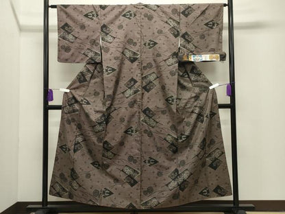 平和屋着物●本場大島紬　7マルキ　泥染め　色紙重ね花文　有限会社かわしげ謹製　証紙付き　正絹　逸品　CABI1104gh