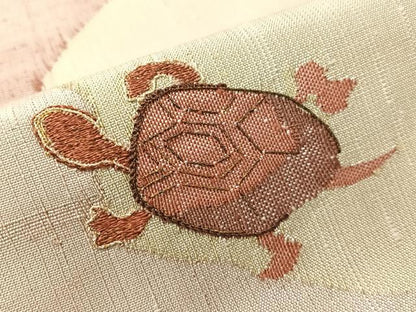 平和屋着物●九寸名古屋帯 紬地 刺繍 亀 金糸 反端付き 正絹 逸品 CABI4305vp