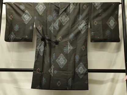 平和屋着物＃本場大島紬　道中着　割り込み絣　地空き　花菱文　黒地　ロング丈　正絹　逸品　CABI6204in