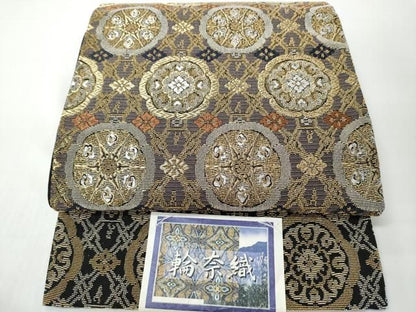 平和屋着物●西陣　岡文織物謹製　六通柄袋帯　輪奈織　舞花文　黒地　金銀糸　証紙付き　正絹　逸品　未使用　CABN8303hy