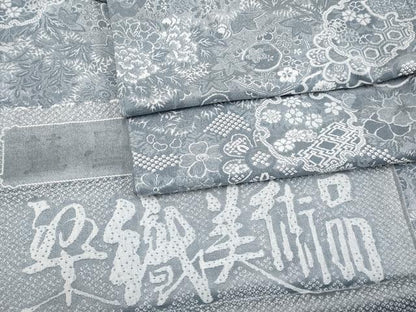 平和屋着物■極上　山岡古都・古都染人　染織美術品　薬墨染　天目織　お召　雪輪重ね草花文　湊鼠色　反端付き　逸品　未使用　CYAA2901s5