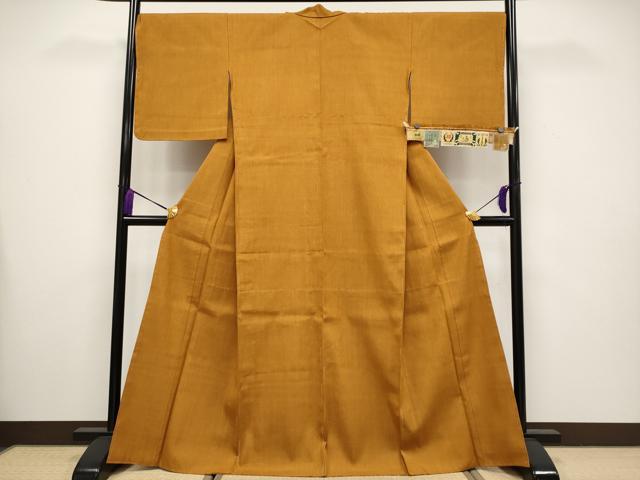 平和屋本店■極上　本場結城紬　重要無形文化財　奥順謹製　胴抜き仕立て　色無地　琥珀色地　証紙付き　逸品　未使用　CYAA3503s5