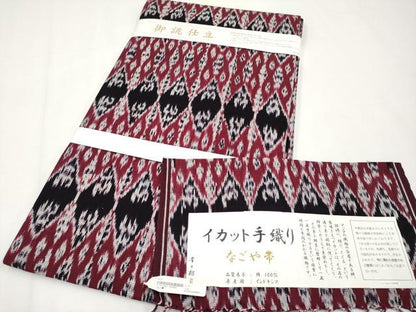 平和屋着物●極上 京都染織メーカー・貴久樹謹製 イカット 全通柄 九寸名古屋帯 手織 葡萄色 証紙付 綿 逸品 未使用 CYAA3750s5