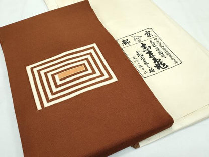 平和屋本店■極上　銀座　志ま亀　九寸名古屋帯　渦巻き文様　金彩　鬼しぼ縮緬　唐茶色地　たとう紙付き　逸品　CZAA3049s5