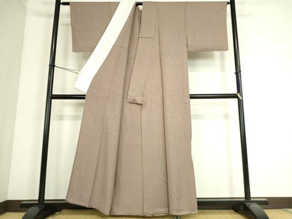 平和屋着物▽上質な色無地 単衣 芝地紋 薄柿色 正絹 逸品 DAAS0350az