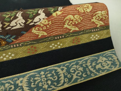 平和屋着物●綴れ　八寸名古屋帯　名物裂　花兎　荒磯　黒地　金糸　正絹　逸品　DAAU5331ps
