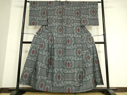平和屋着物▽本場大島紬　単衣　割り込み絣　花菱文　正絹　逸品　DAAV5564az
