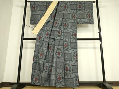 平和屋着物▽本場大島紬　単衣　割り込み絣　花菱文　正絹　逸品　DAAV5564az