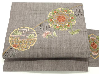 平和屋着物●中国三大刺繍 スワトウ刺繍 汕頭刺繍 相良刺繍 総刺繍 九寸名古屋帯 紬地 正倉院雪輪花文 鳩羽色 正絹 逸品 未使用 DAAV9143ob