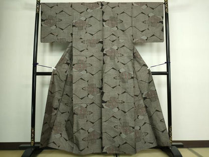 平和屋着物▽本場大島紬 単衣 9マルキ 幾何学花文 正絹 逸品 DAAV9942sf