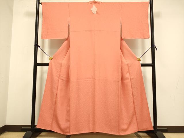 平和屋着物●上質な色無地 吉祥花地紋 赤丹色 正絹 逸品 未使用 DAAZ5117du