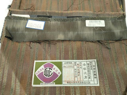 平和屋着物●本場奄美大島本泥染 赤塚次男 両方向 両面全通柄袋帯 菱間道 金糸 証紙付き 正絹 逸品 未使用 DABB4086ps