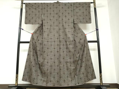 平和屋着物●本場大島紬　龍郷絣　花菱文　正絹　逸品　未使用　DABC2611ud
