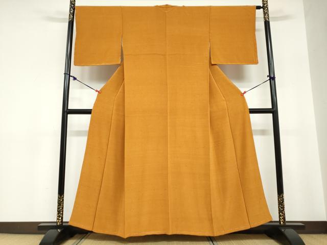 平和屋着物●上質な色無地　黄茶色　お召縮緬　正絹　逸品　未使用　DABC2726ud