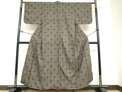 平和屋着物●本場大島紬　龍郷絣　花菱文　正絹　逸品　未使用　DABC2761ud