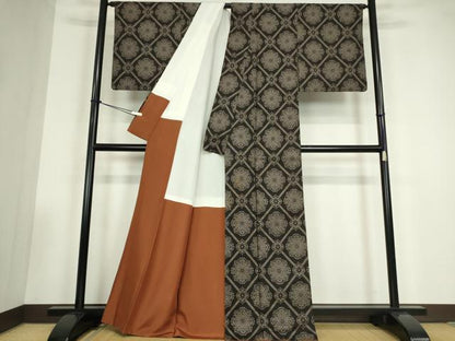 平和屋着物●本場大島紬　9マルキ　古代純泥染　正倉院天井花文　安田織物謹製　証紙付き　正絹　逸品　DABC3507az