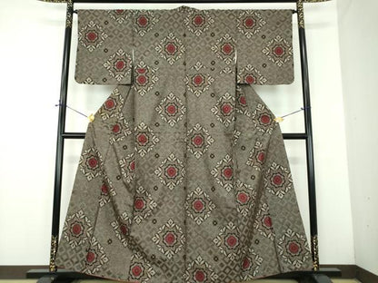 平和屋着物●本場大島紬　龍郷絣　花菱文　正絹　逸品　DABD1644ps