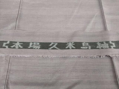 平和屋着物●国指定重要無形文化財　本場久米島紬　手織　希少色　色無地　薄色　反端付き　正絹　逸品　DABD1837ps