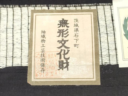 平和屋着物●結城紬　反物　着尺　100亀甲　飛び亀甲柄　舞花文　証紙付き　逸品　未使用　DABD4633zy