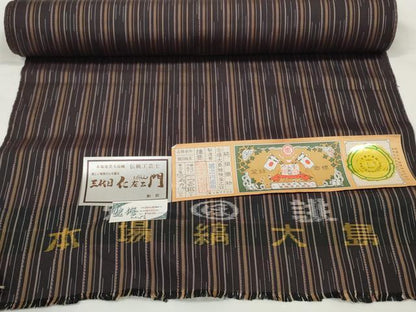 平和屋着物●伝統工芸士 三代目仁左衛門監修　本場縞大島紬　反物　着尺　間道　堀之内織物謹製　証紙付き　逸品　未使用　DABD8340zzz