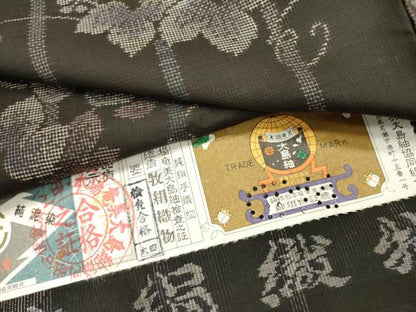 平和屋着物●本場大島紬　古代染色純泥染　9マルキ　蔦の葉唐草間道　牧絹織物謹製　証紙付き　正絹　逸品　未使用　DABF2268fe