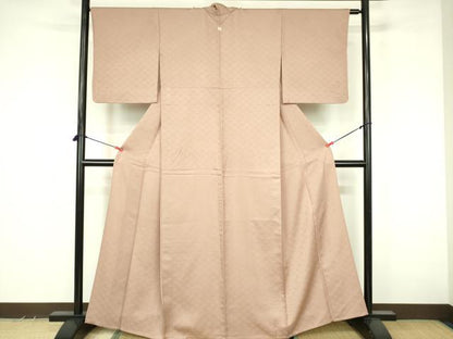 平和屋着物▽上質な色無地　単衣　七宝花地紋　水柿色　正絹　逸品　DABF3609op