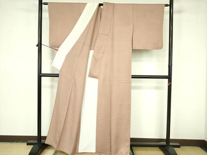 平和屋着物▽上質な色無地　単衣　七宝花地紋　水柿色　正絹　逸品　DABF3609op