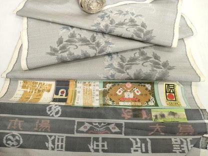 平和屋着物●本場大島紬　白大島　反物　着尺　7マルキ　総絣　花唐草文　たかし謹製　証紙付き　逸品　未使用　DABH2402zzz