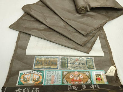 平和屋着物●本場大島紬　反物　着尺　9マルキ　古代染色純泥染　松皮菱　大島紬弘義謹製　証紙付き　逸品　未使用　DABH2564zzz