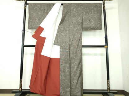 平和屋着物●本場大島紬　9マルキ　古代染色純泥染　更紗花唐草文　牧絹織物謹製　証紙付き　正絹　逸品　DABH9253ps