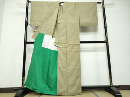 平和屋着物●本場結城紬　重要無形文化財　背抜き仕立て　鶸茶色　正絹　逸品　DABI9935ud