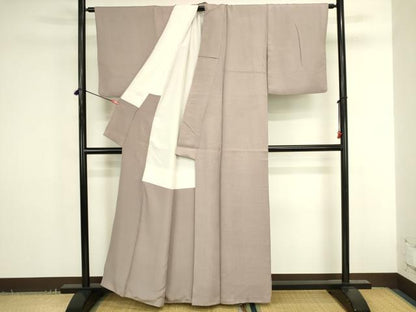 平和屋着物●上質な色無地　抽象地紋　薄柿色　正絹　逸品　DABK2726op
