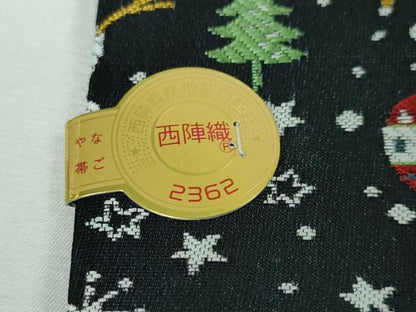 平和屋本店■極上　西陣 大光織物謹製 全通柄 九寸名古屋帯 クリスマス トナカイ 雪だるま 黒地 金糸 証紙付き　逸品　新品　DZAA3032kh5 - 平和屋
