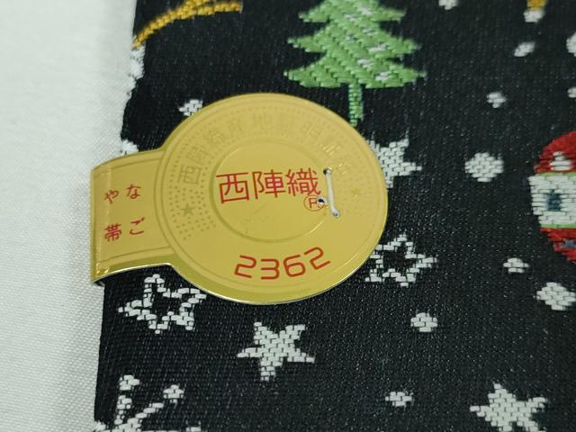 平和屋本店■極上　西陣 大光織物謹製 全通柄 九寸名古屋帯 クリスマス トナカイ 雪だるま 黒地 金糸 証紙付き　逸品　新品　DZAA3032kh5 - 平和屋