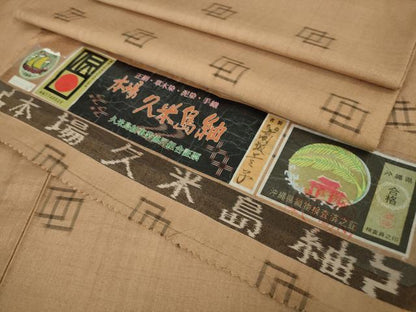 平和屋本店■極上　国指定重要無形文化財　本場久米島紬　単衣　高坂エミ子作　手織　赤白橡色地　証紙付き　逸品　DZAA5594kh5