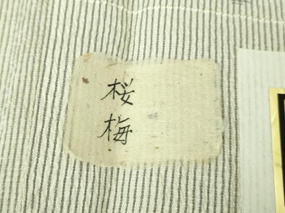 平和屋本店■極上　伝統工芸品　置賜紬　単衣　鬼雛お召　白たか織　桜梅　証紙付き　逸品　未使用　DZAA8091kh5