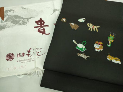 平和屋着物●極上 銀座もとじ 塩瀬 九寸開き名古屋帯 十二支 干支 黒地 たとう紙付き 逸品 未使用 DZAA8283kh5