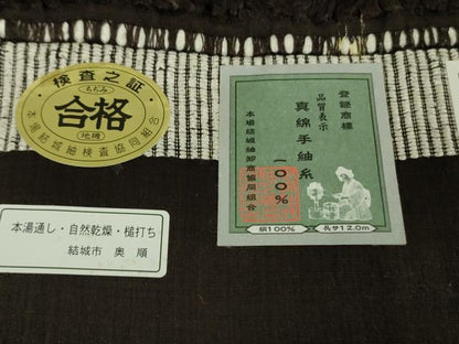 平和屋本店■極上　本場結城紬　重要無形文化財　地機　単衣　奥順謹製　十字絣　真綿手紬糸　黒紅色地　証紙付き 逸品 未使用 DZAA8718kh5