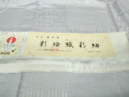 平和屋着物■極上　桐生織　影絵織彩紬　単衣　音符　ピアノ　薄葡萄色地　泉織物謹製　証紙付き　逸品　DZAB1117kh5