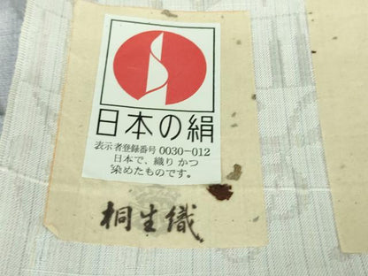 平和屋着物■極上　桐生織　影絵織彩紬　単衣　音符　ピアノ　薄葡萄色地　泉織物謹製　証紙付き　逸品　DZAB1117kh5