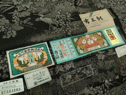 平和屋着物●希少　本場大島紬　吉三郎　吉織物謹製　割込絣織　古代染色純泥染　らんまん　証紙付き　逸品　未使用　DZAB2999kh6