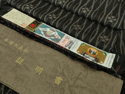 平和屋着物●極上　本場大島紬 7マルキ 古代染色純泥染　網目花文　西村絹織物謹製　黒地　ロング丈　証紙付き　逸品　未使用　DZAB3045kh6