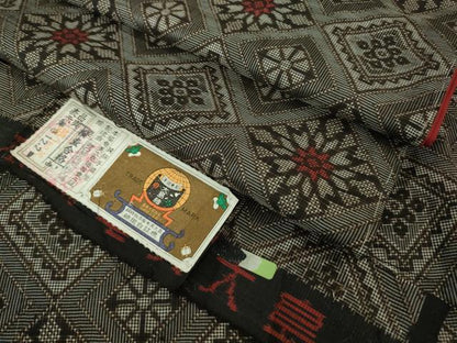 平和屋着物●希少　本場大島紬　龍郷絣　野口哲弘織物謹製　証紙付き　逸品　未使用　DZAB3804kh6