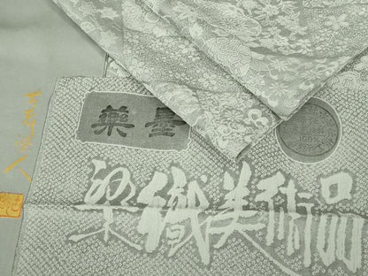 平和屋着物●極上　山岡古都・古都染人　染織美術品　薬墨染　天目織　お召　吉祥花松文　反端付き　逸品　未使用　DZAB5174kh6