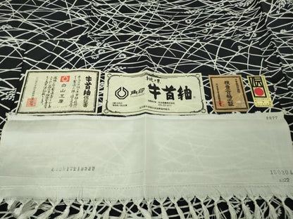 平和屋本店●極上　石川県指定無形文化財　牛首紬　白山工房　手織り　稲穂　黒地　まるやま扱い　証紙付き　逸品　未使用　DZAB6052kh6