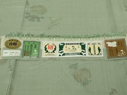 平和屋本店●極上　本場結城紬 重要無形文化財 奥順謹製　100亀甲　飛び亀甲柄　宝尽くし　山葵色地　証紙付き　逸品　未使用　DZAB6303kh6