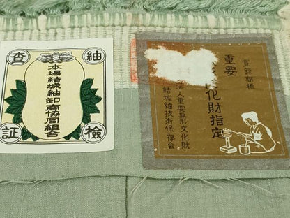 平和屋本店●極上　本場結城紬 重要無形文化財 奥順謹製　100亀甲　飛び亀甲柄　宝尽くし　山葵色地　証紙付き　逸品　未使用　DZAB6303kh6