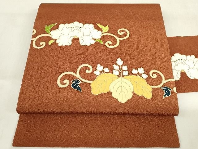 平和屋本店■極上　銀座　志ま亀　九寸名古屋帯　桐牡丹唐草　金彩　鬼しぼ縮緬　柿茶色　正絹　逸品　未使用　KAAA1578kk4 - 平和屋